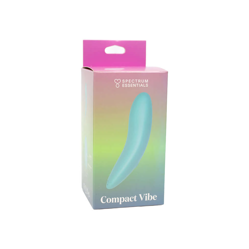 Spectrum Essentials Compact External Vibrator Blue packaging displayed with a soft blue design and pink accents.