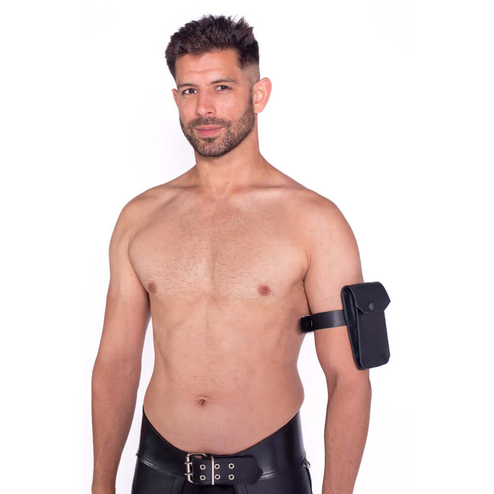 Prowler RED Leather Large Belt Pouch worn by a model on a bare upper arm, showcasing its bold style and functionality.