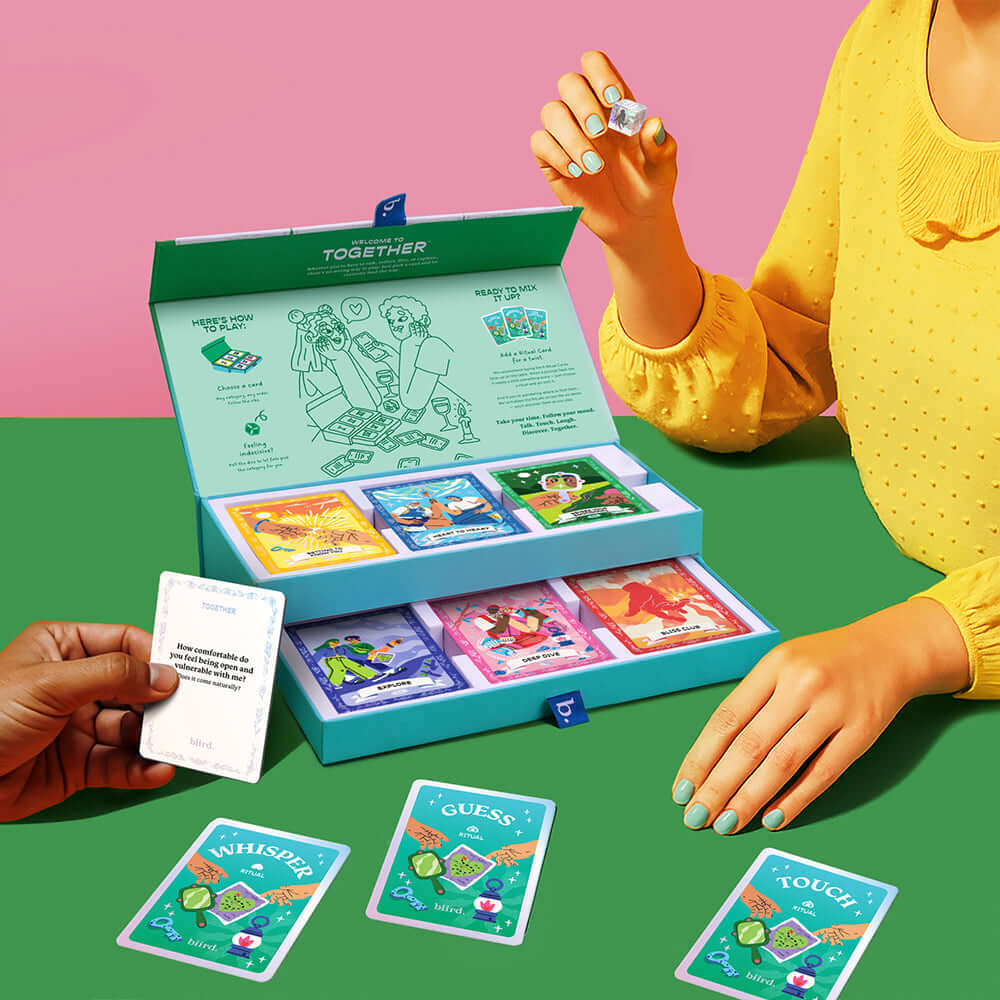 Biird x Jouissance Club Together Couples Card Game showing cards and box for playful intimacy and connection.