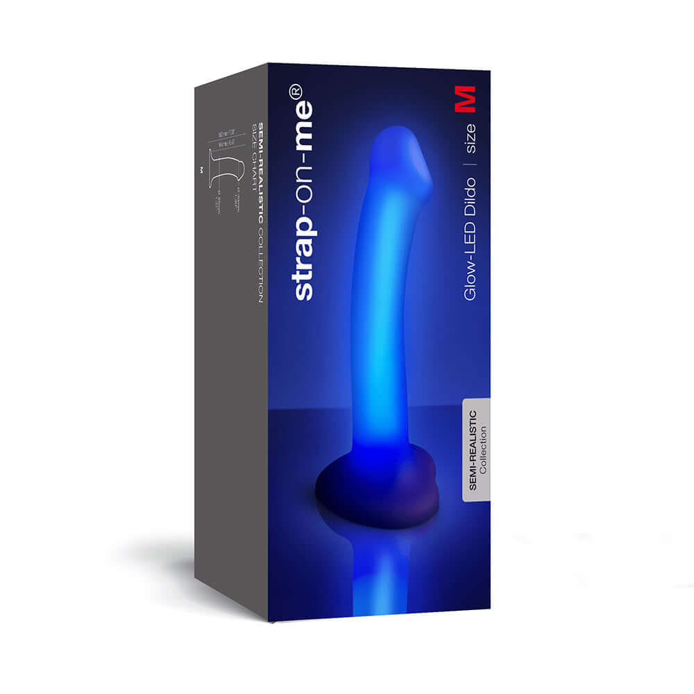 Strap On Me Glow LED Dildo size M packaging with luminous blue design showcasing its semi-realistic shape.