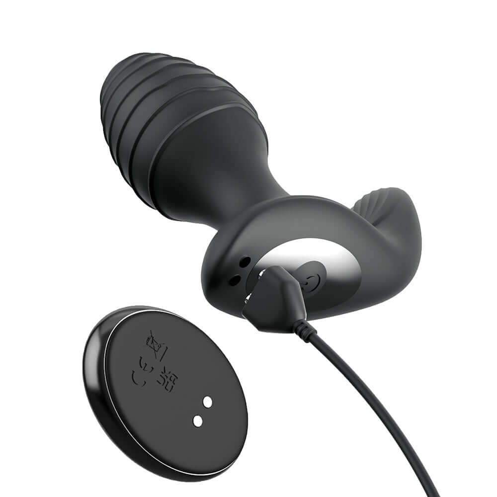 Anal Fantasy Elite Gyro-Milk Pro Black showing the vibrating plug and remote control for enhanced prostate pleasure.