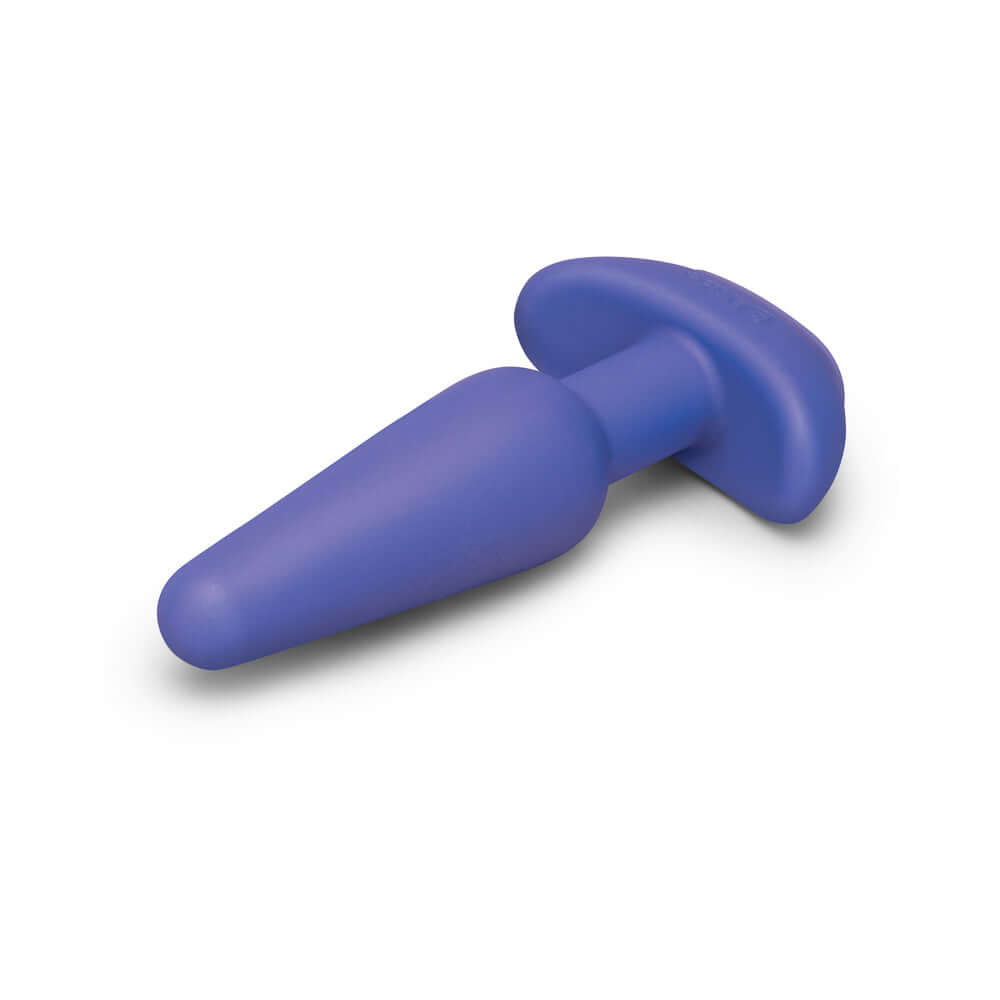 b-Vibe Butties Shake Vibrating Butt Plug in purple silicone, designed for powerful stimulation and comfort.