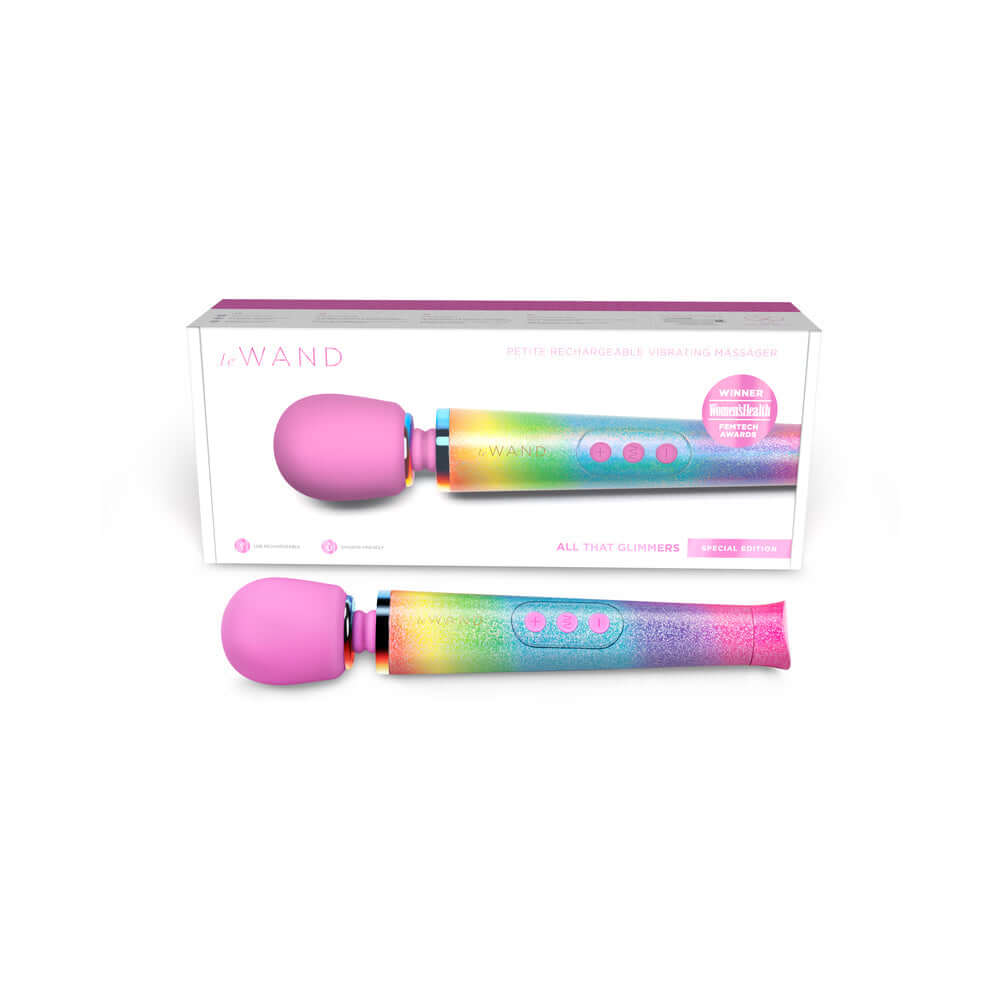 Le Wand Petite All That Glimmers Ombre high-performance wand massager with rainbow ombre finish in packaging.