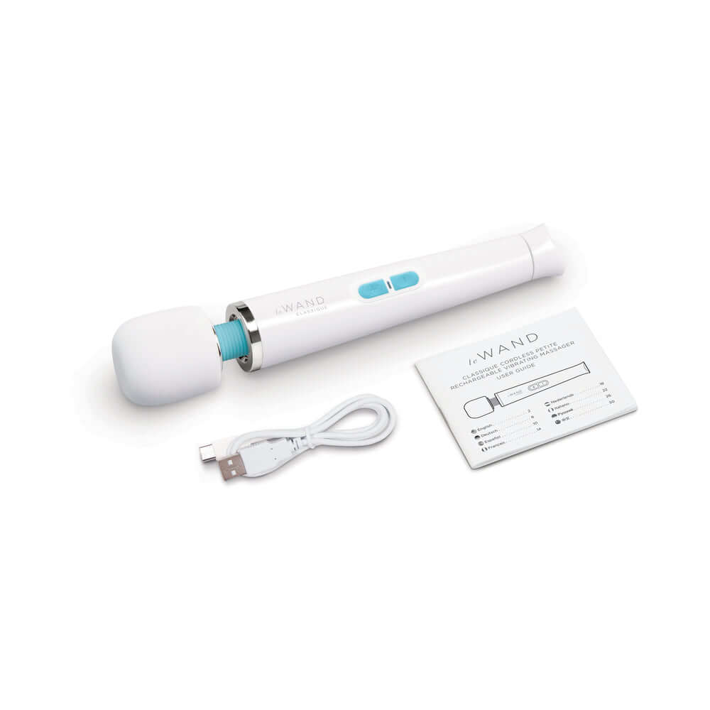 Le Wand Classique Petite Wand Massager with USB charging cable and user manual.