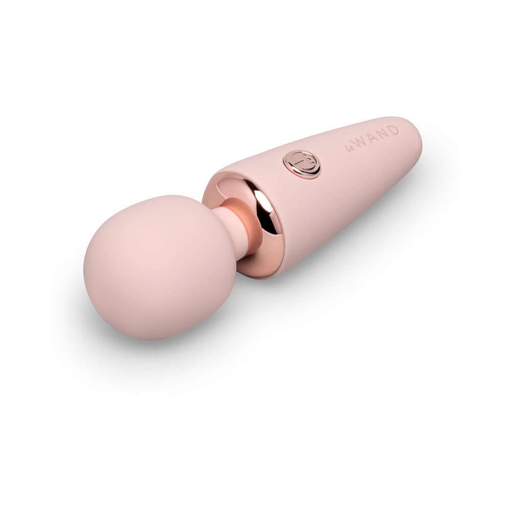 Le Wand Mini Micro Wand Rose Gold on a white background for discreet pleasure and stimulation.