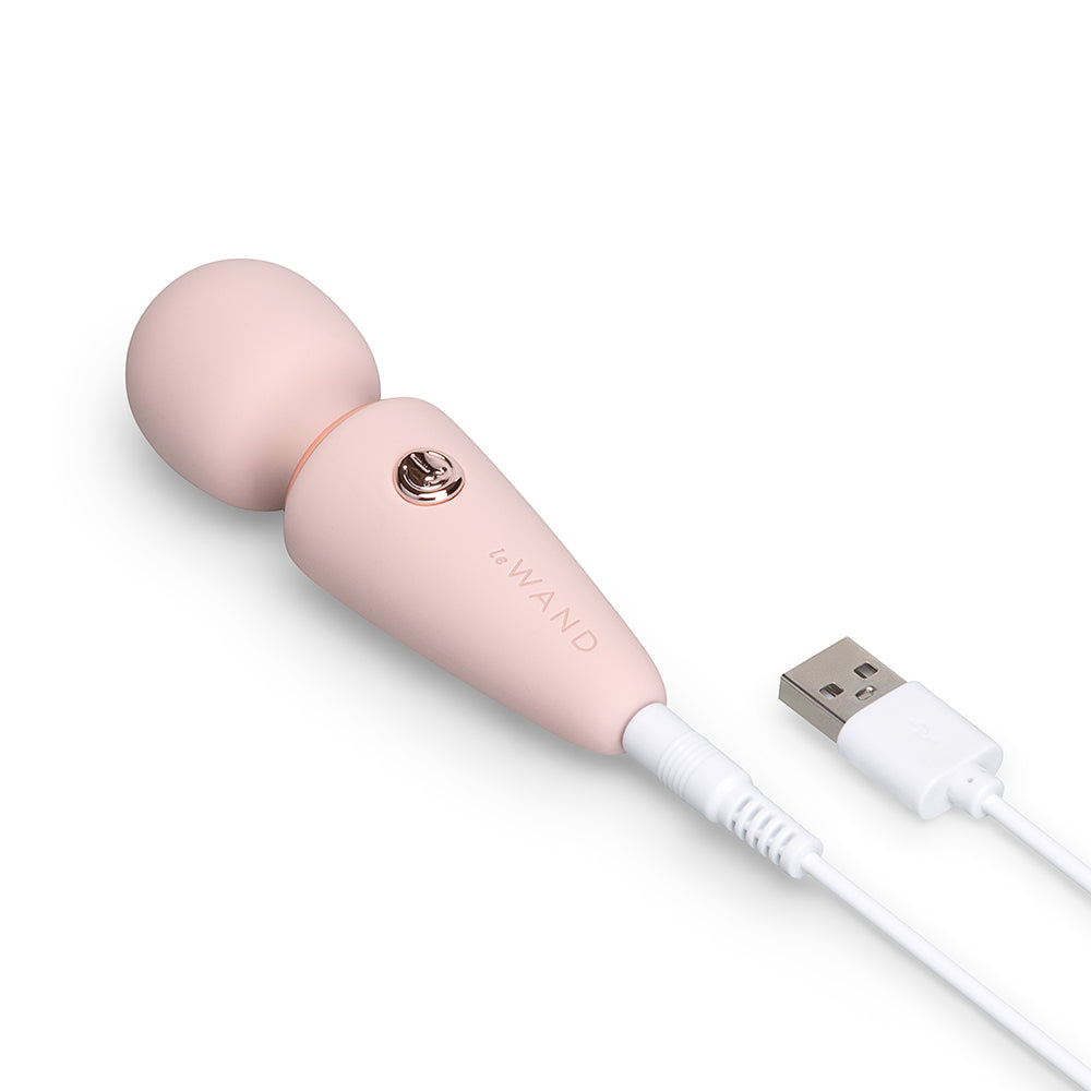 Le Wand Mini Micro Wand Rose Gold charging with USB, compact design for discreet pleasure.
