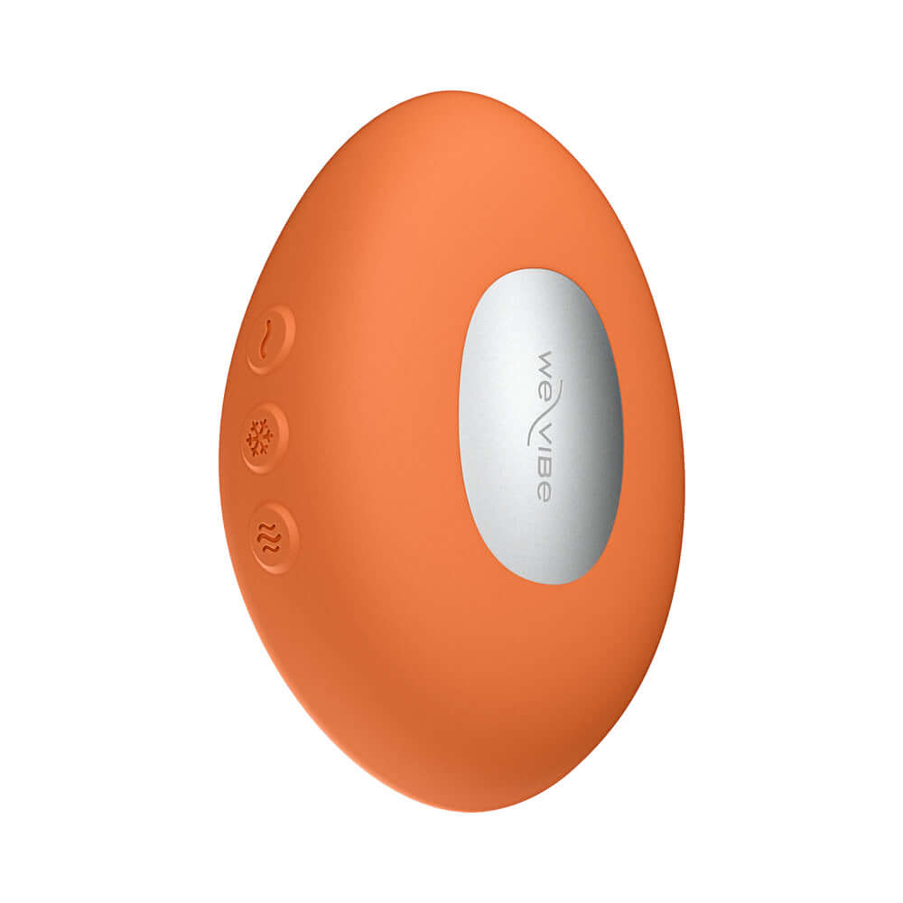 We-Vibe Temp Clitoral Massager Tangerine ergonomic design with heating and cooling features.