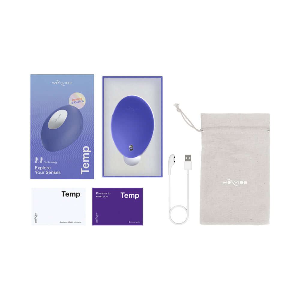We-Vibe Temp Clitoral Massager Lavender Blue packaging and accessories including USB charger.