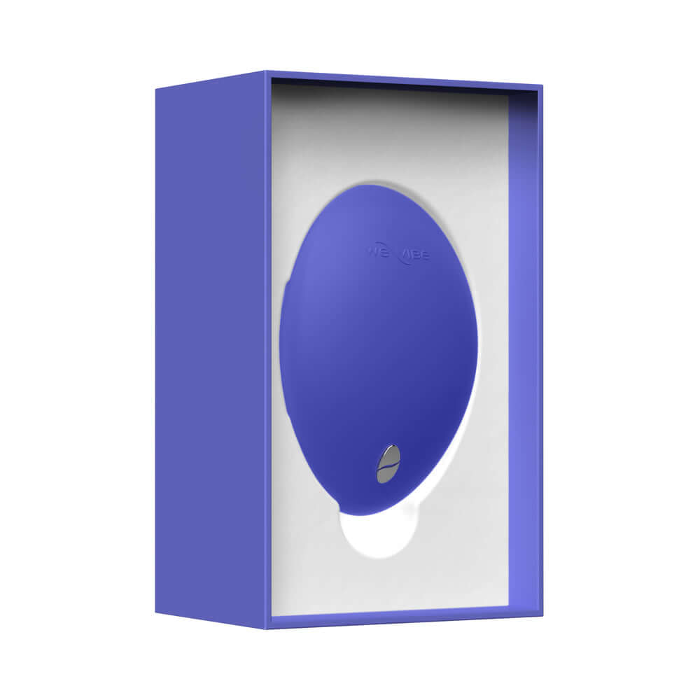 We-Vibe Temp Clitoral Massager Lavender Blue in elegant packaging, showcasing innovative design and technology.