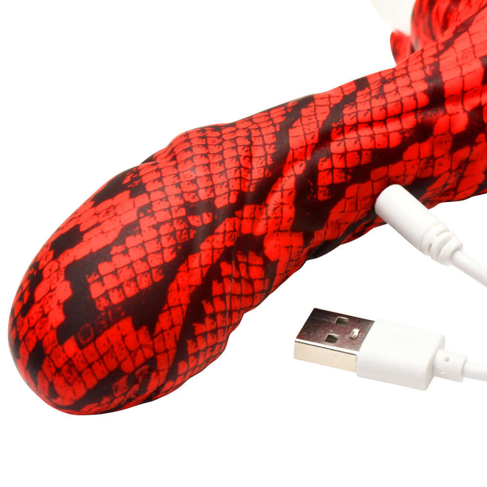 Creature Cocks Cobra Scepter Plasma Vibrator in dark red with USB charging cable.