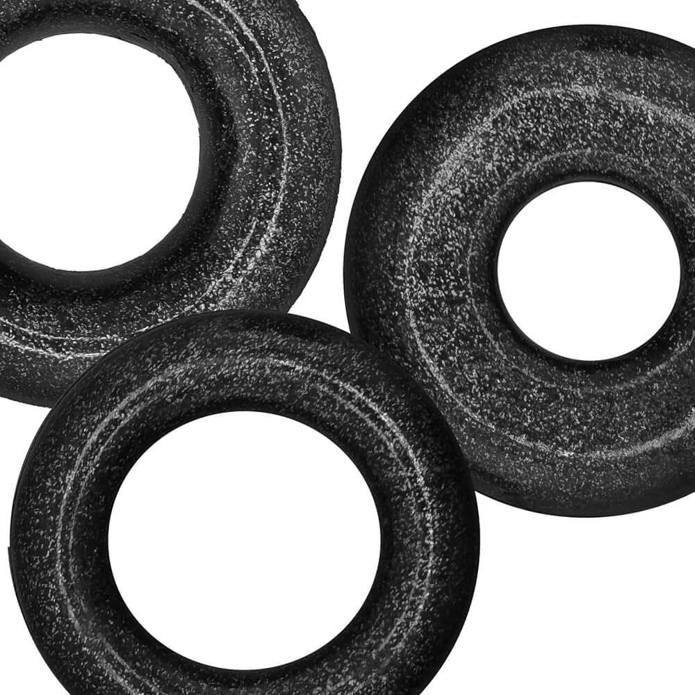 Oxballs Cockpack Multi Design 3-Pack Black Mica featuring three different cock rings.