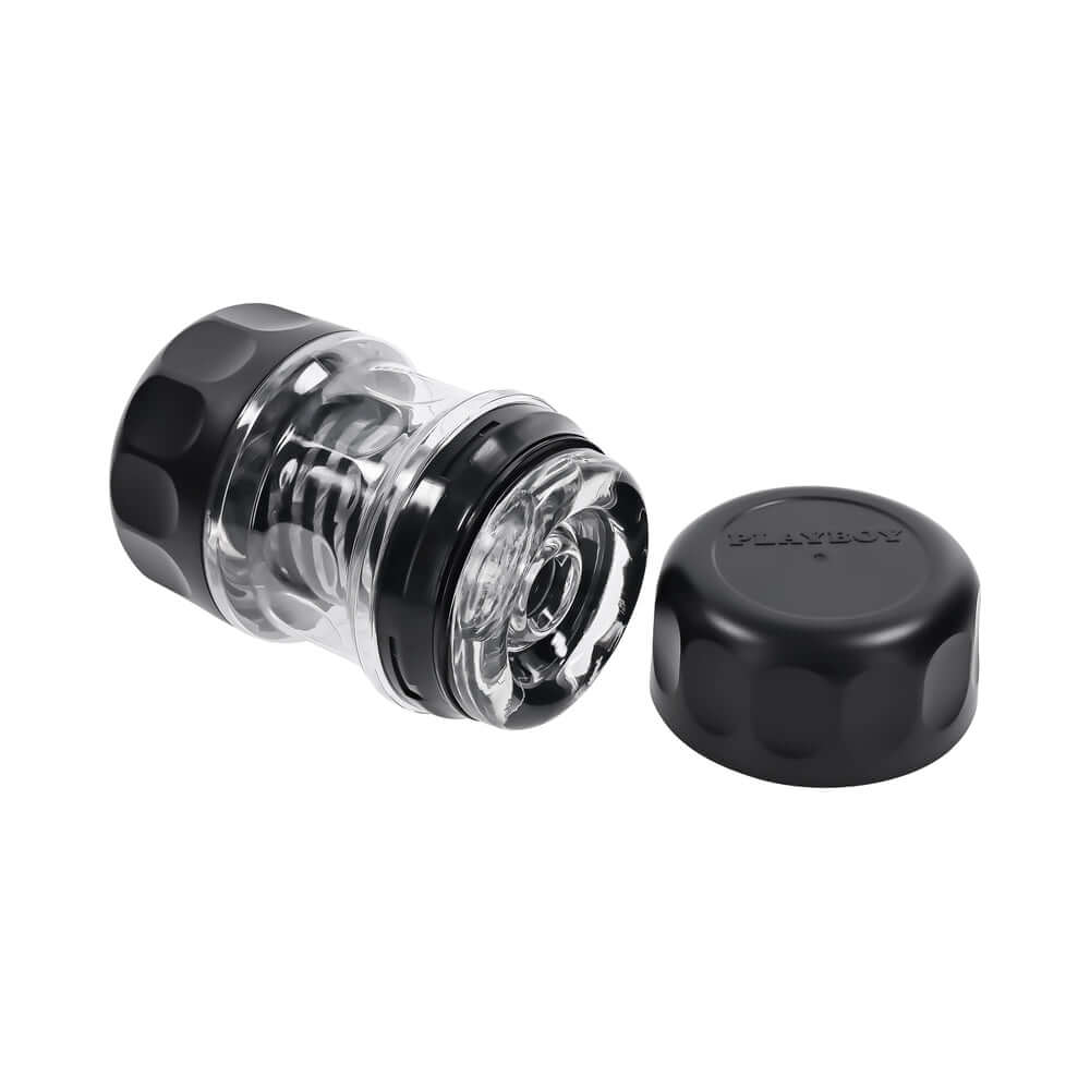 Playboy Pleasure Spring Fling Clear stroker with a sleek black cap and transparent body for a sensual experience.