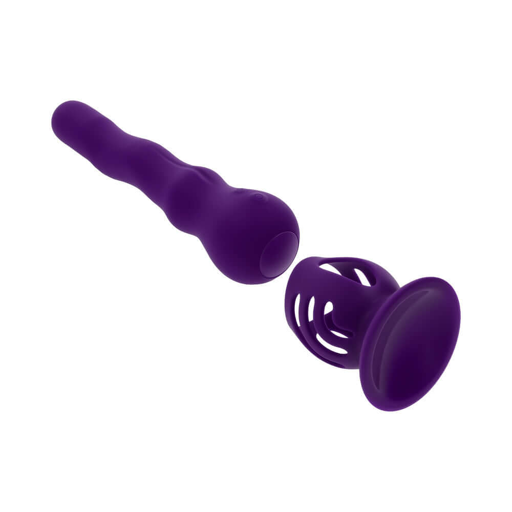 Playboy Wiggle It Vibrator Acai featuring a twisting, purple shaft and cup for unique pleasure experiences.