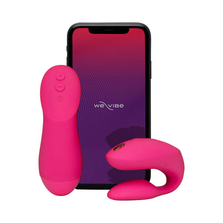 We-Vibe Chorus Pro Couples Massager Electric Pink with remote and app display on smartphone.