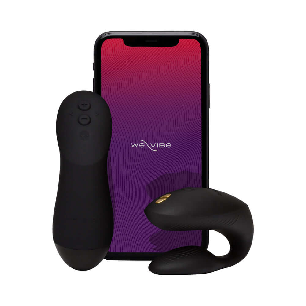 We-Vibe Chorus Couples Vibrator with Remote Control Black next to smartphone displaying Vibrator controls.