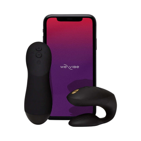 We-Vibe Chorus Couples Vibrator with Remote Control Black next to smartphone displaying Vibrator controls.