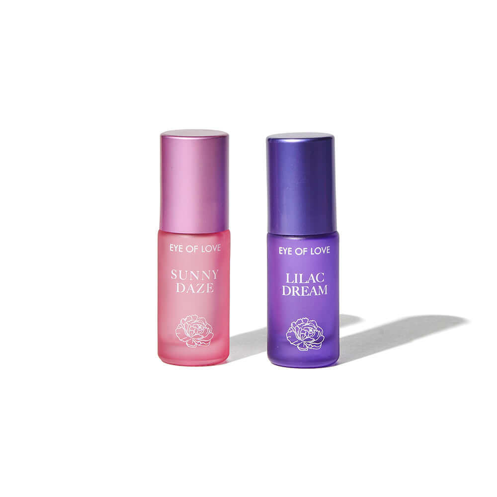 Eye of Love Pheromone Perfume Roll-On Set featuring SUNNY DAZE and LILAC DREAM fragrances.