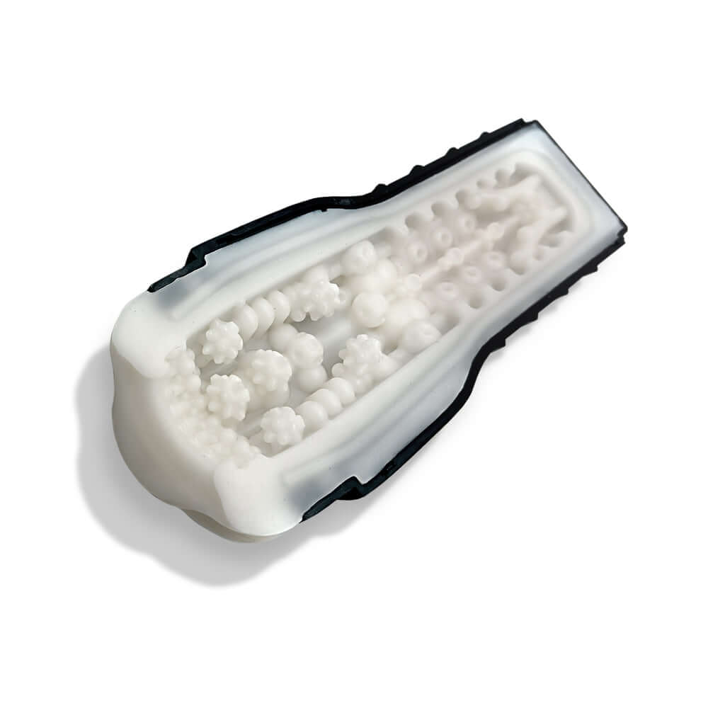 MSTR B8 Goon & Grip Vibrating Pressure Play Stroker with intricate internal texture for enhanced pleasure.