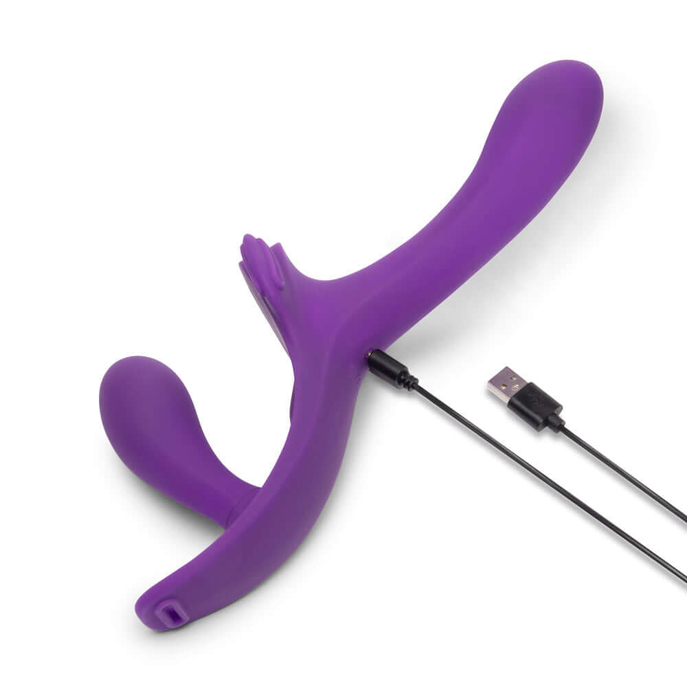 Together Lock-In Dual-Ended Vibrating Strap-on & Harness Set in vibrant purple with USB charging cable.