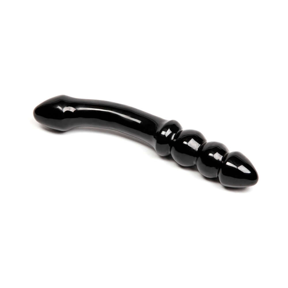 Chakrubs Xaga Viper Obsidian Wand showcasing its unique curvature and ridged design for enhanced pleasure.