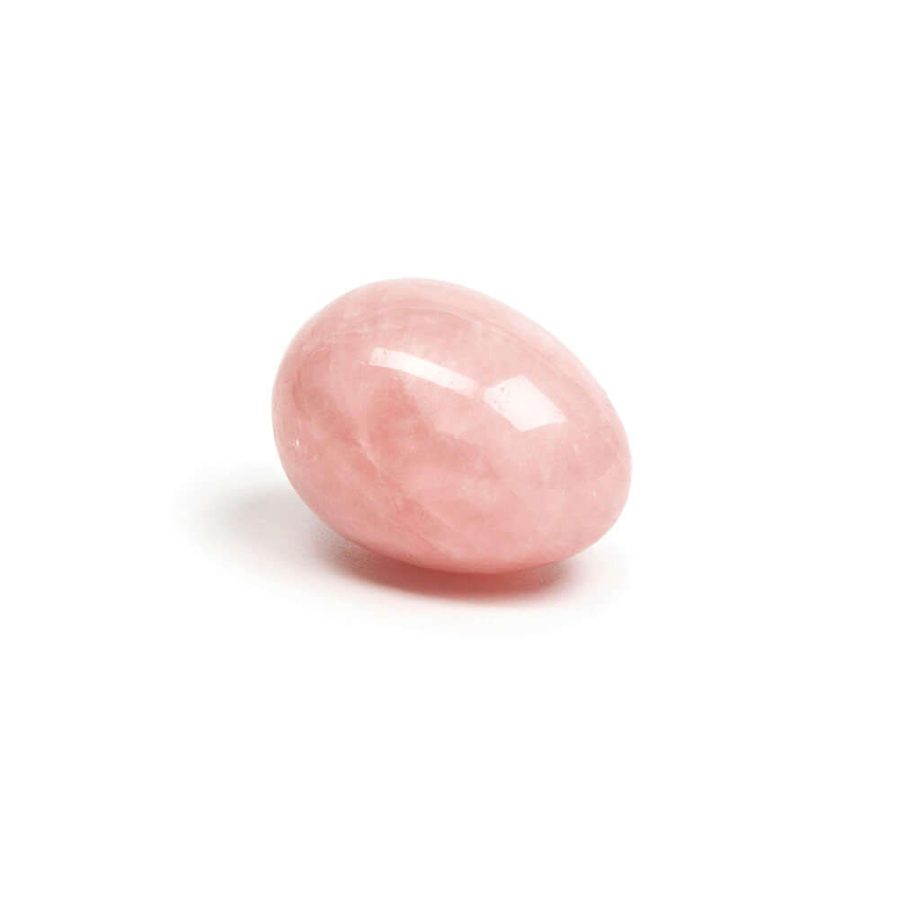 Chakrubs Heart Yoni Egg Rose Quartz non-drilled displayed on a light background, showcasing its smooth surface and pink hue.