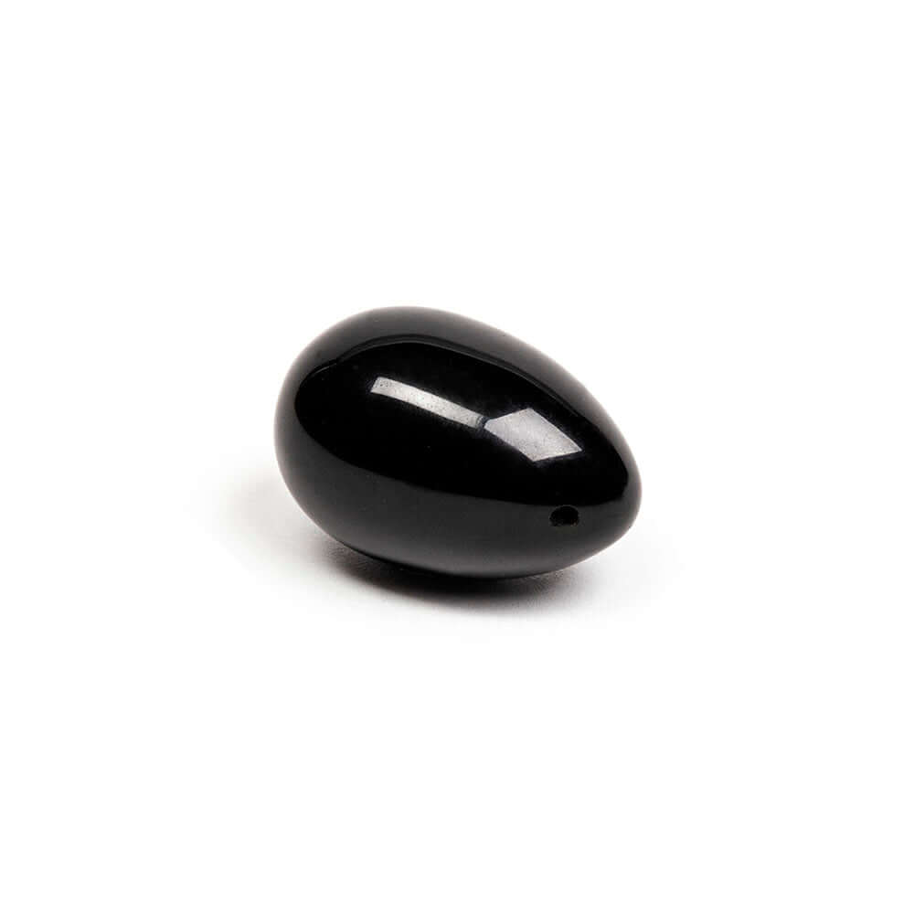 Chakrubs Xaga Yoni Egg Obsidian drilled - hand-carved black obsidian yoni egg for wellness and muscle strengthening.