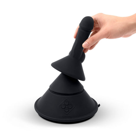 Cowgirl Cone Premium Sex Machine with App and Remote Control being held, showcasing its ergonomic design and premium silicone.