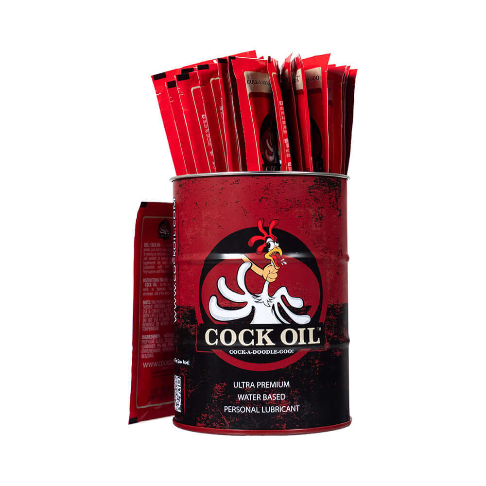 Cock Oil Drum With 25 Foil Lubricant Packets, featuring water-based personal lubricant in a collectible can.