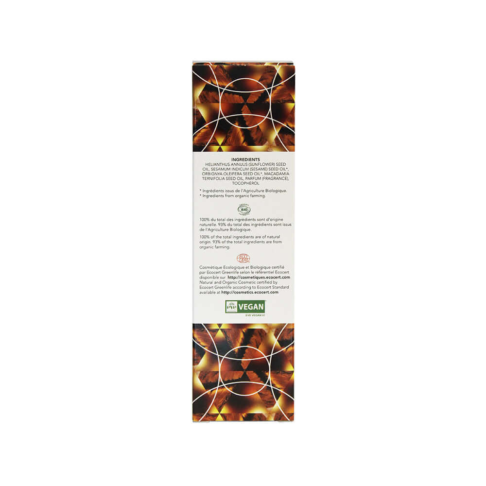 Exsens Body Oil Tiger Eye Macadamia 3.4 Oz ingredient list and packaging details on the back of the bottle.