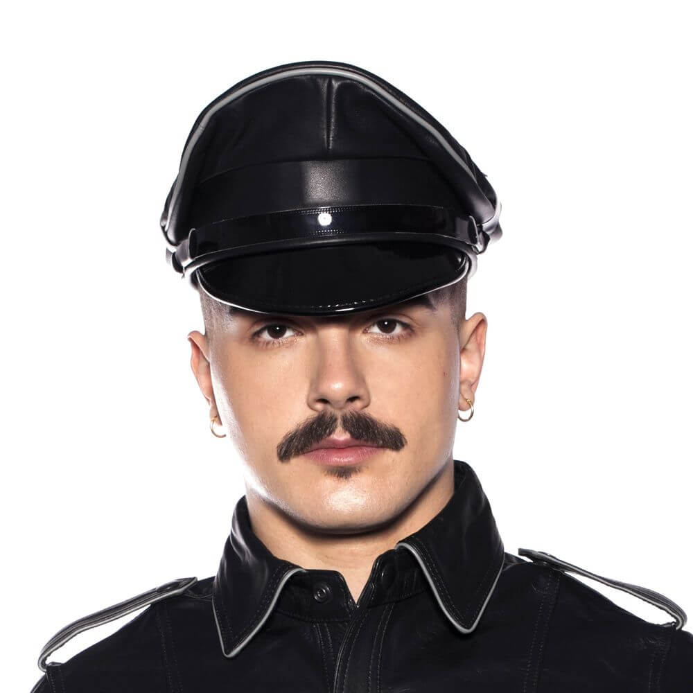 Prowler RED Military Cap Grey Large 59cm worn by a model with a structured cap and leather outfit.
