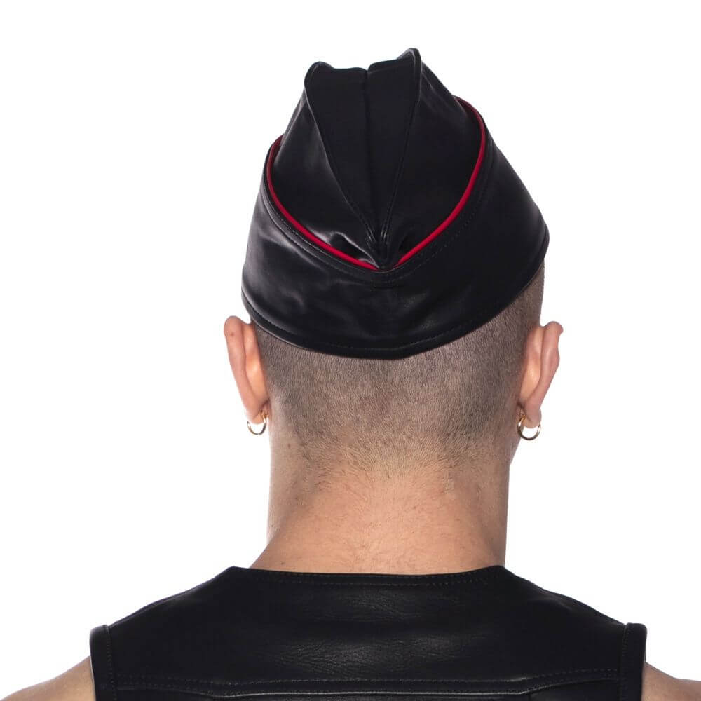 Prowler Red Triangle Cap Black Red 57 cm Medium worn from the back, showcasing its stylish design and distinctive red trim.