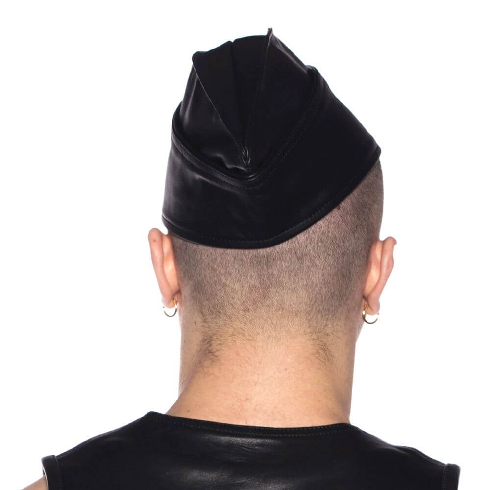 Prowler Red Triangle Cap Black 55 cm Small worn from the back, showcasing its sleek leather design.