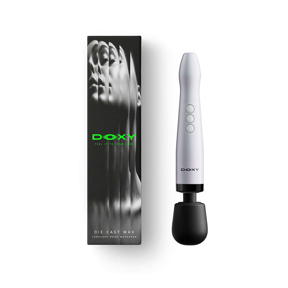 Doxy Die Cast Max Cordless Wand White with sleek packaging displaying face art and branding.