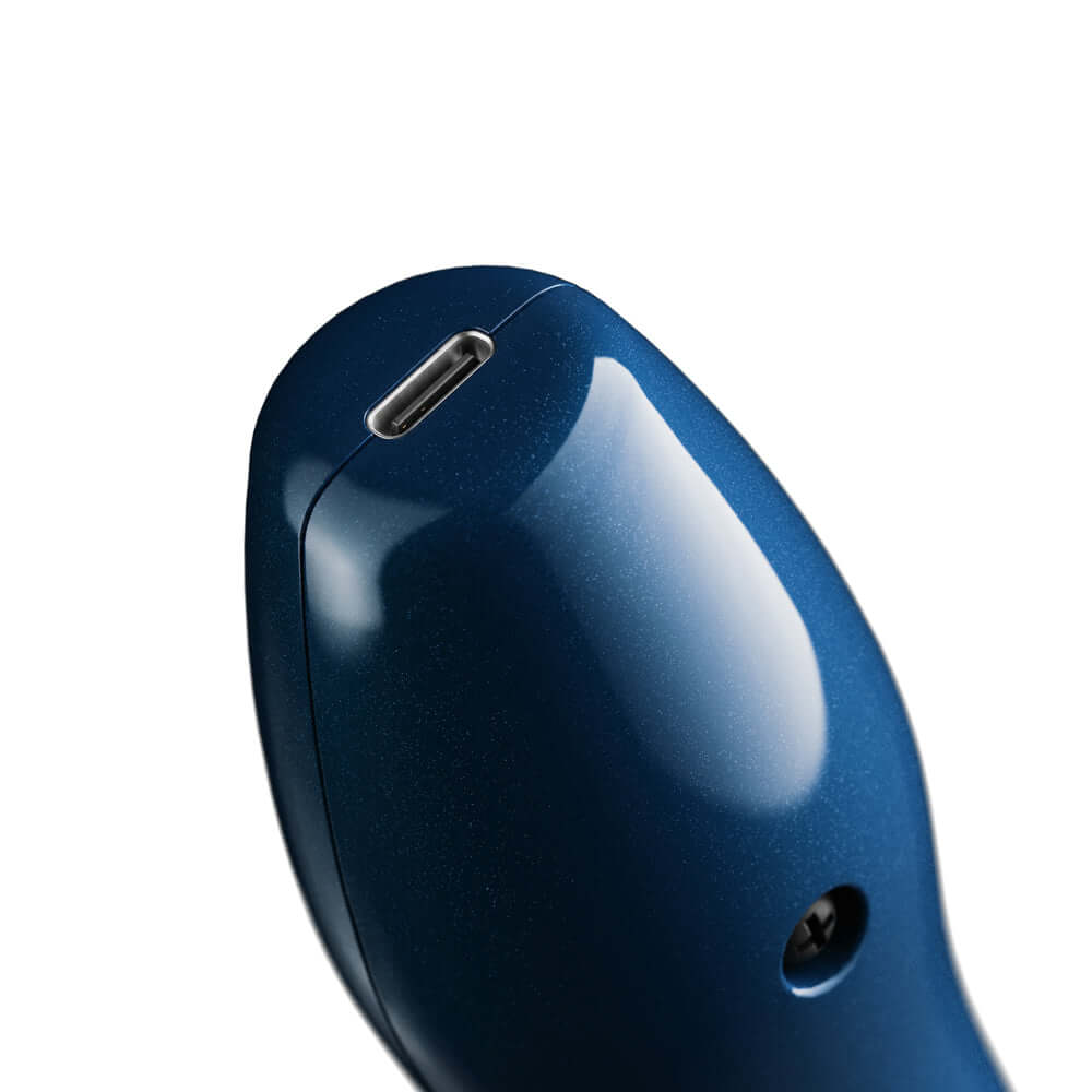 Doxy Die Cast Compact Cordless Wand Blue close-up showing charging port and sleek design.