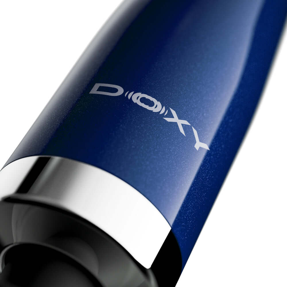 Doxy Die Cast Compact Cordless Wand Blue close-up showing sleek design and branding.