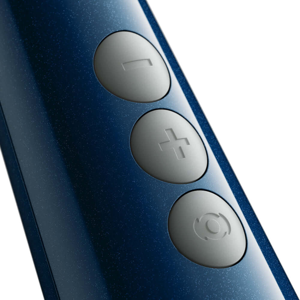 Doxy Die Cast Compact Cordless Wand Blue control buttons close-up in sleek design.