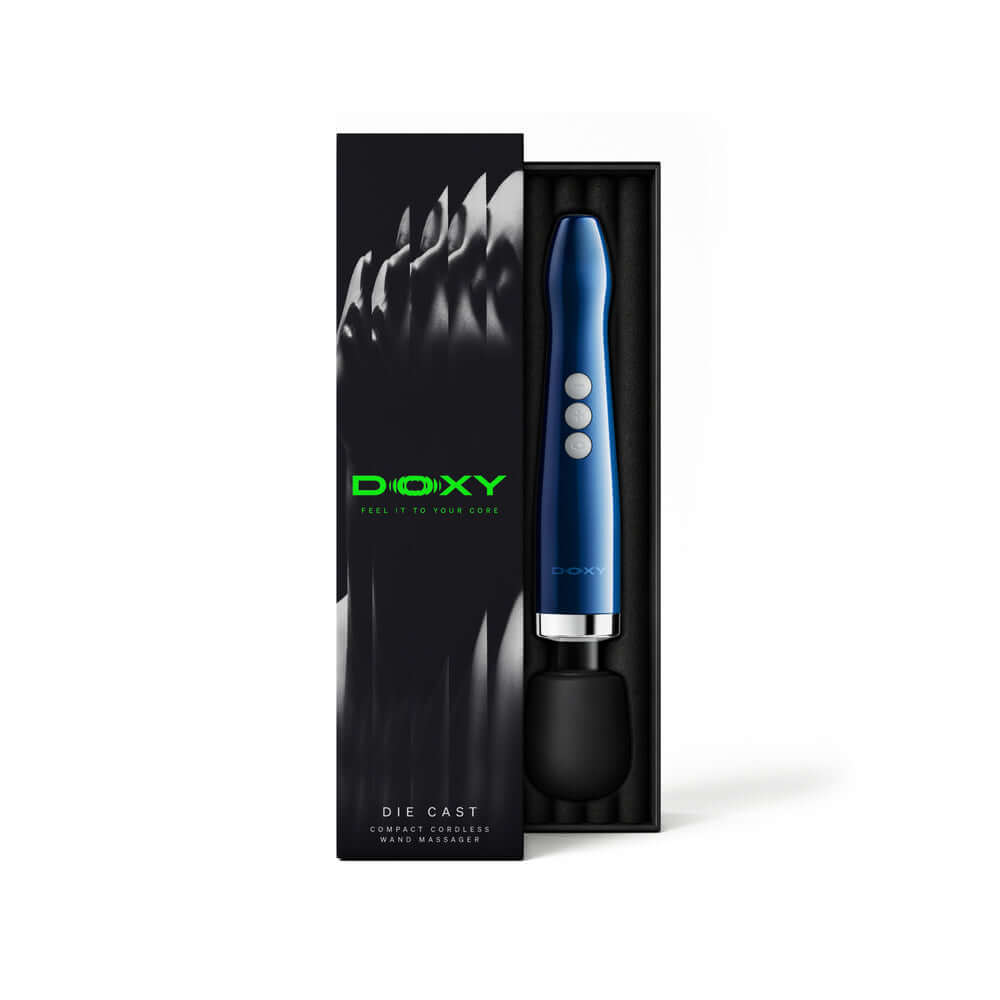 Doxy Die Cast Compact Cordless Wand Blue in box with sleek design and controls.