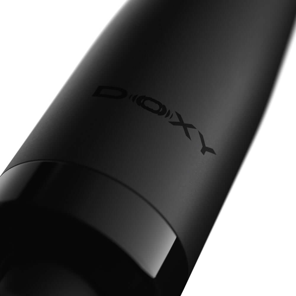 Doxy Die Cast Compact Cordless Wand Black close-up showing sleek black design and branding.
