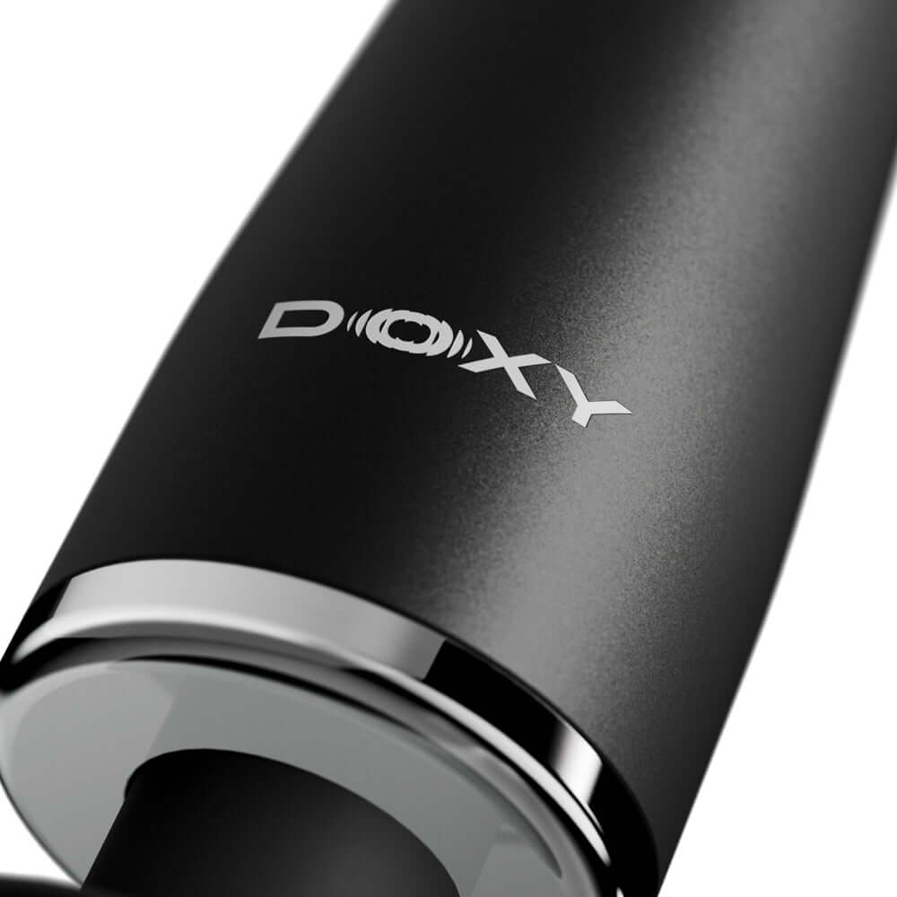 Doxy Go Travel-sized Wand Massager Black close-up showing logo and sleek design for travel and convenience.