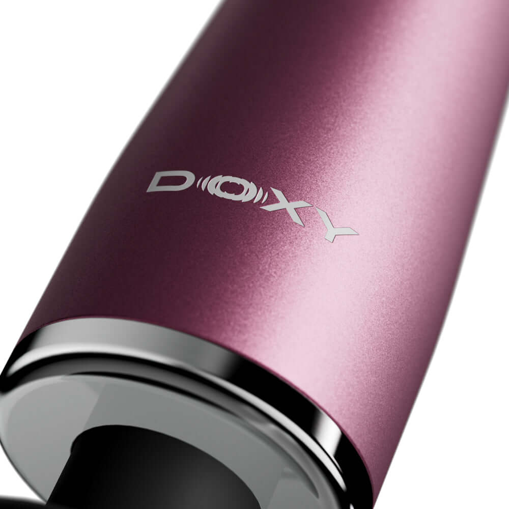 Close-up of the Doxy Go Travel-sized Wand Massager Pink showcasing its sleek anodized aluminum finish.