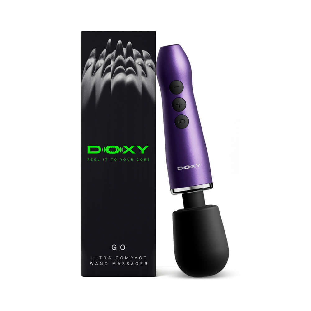 Doxy Go Travel-sized Wand Massager Purple with packaging, compact design for travel and discreet use.