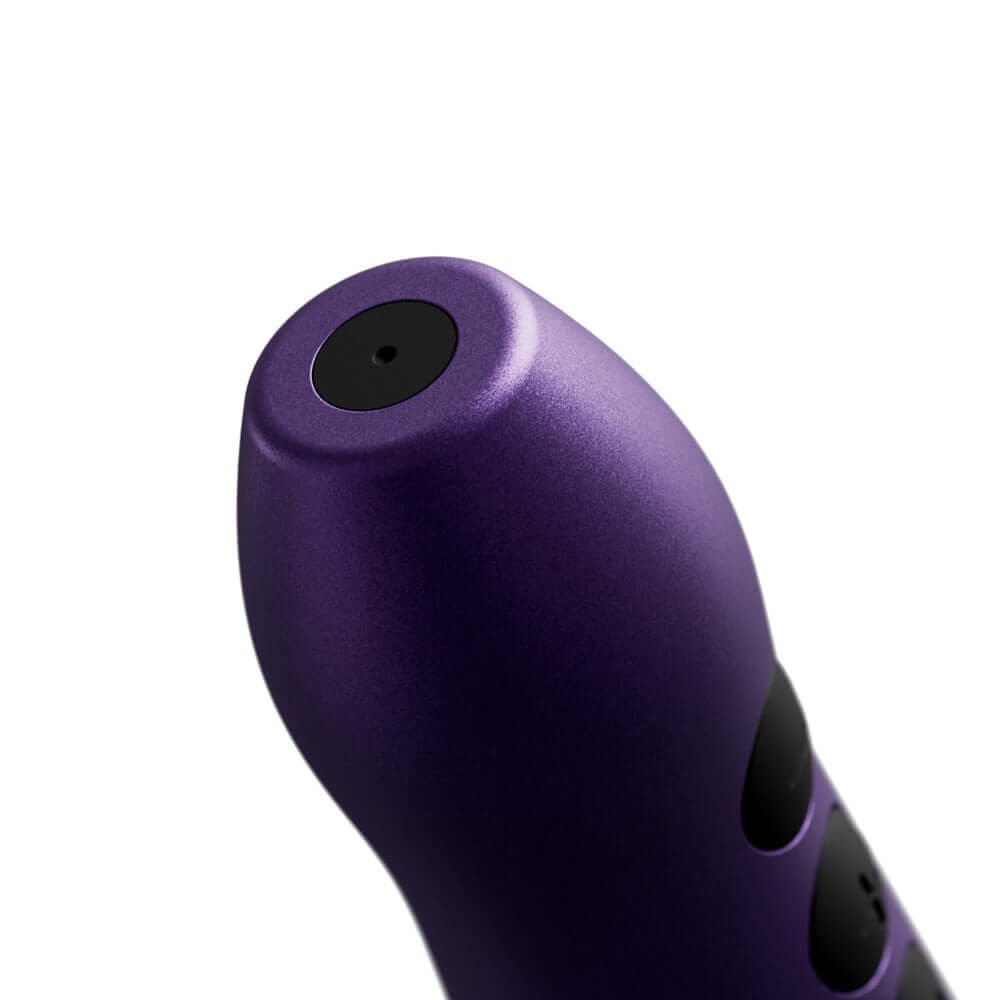 Doxy Go Travel-sized Wand Massager Purple close-up view highlighting the sleek design and controls.
