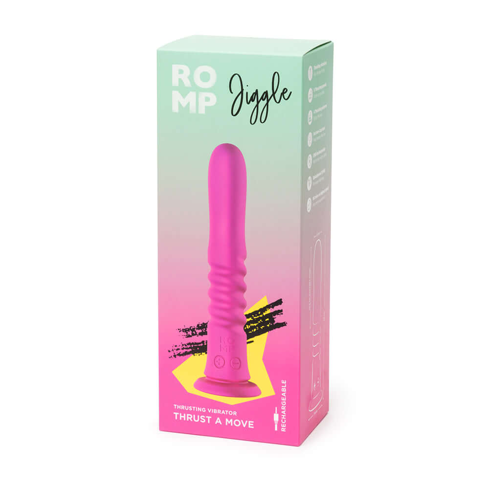 Romp Jiggle Thrusting Vibrator Pink in packaging showcasing its sleek design and advanced thrusting technology.