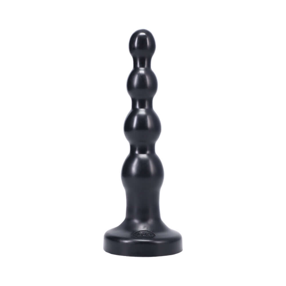 Tantus Ripple Large Silicone Dildo Onyx featuring a sleek black design with a rippled shaft for versatile pleasure.