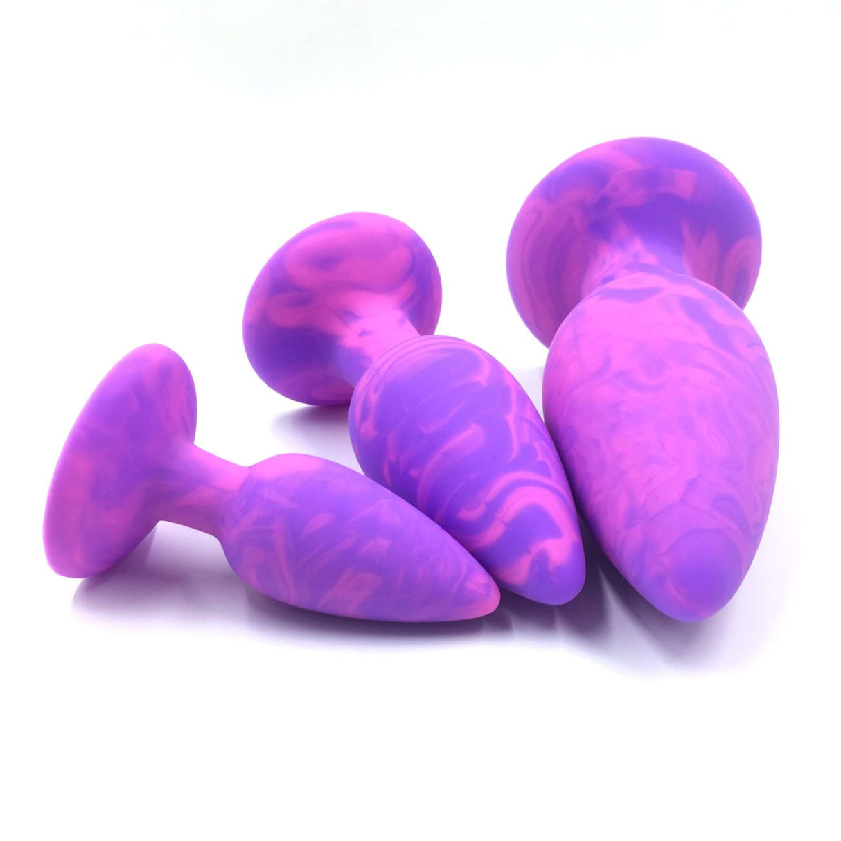 Adam & Eve Groovy Booty Silicone Anal Trainer Set in purple, three progressively sized trainers for comfortable anal play.