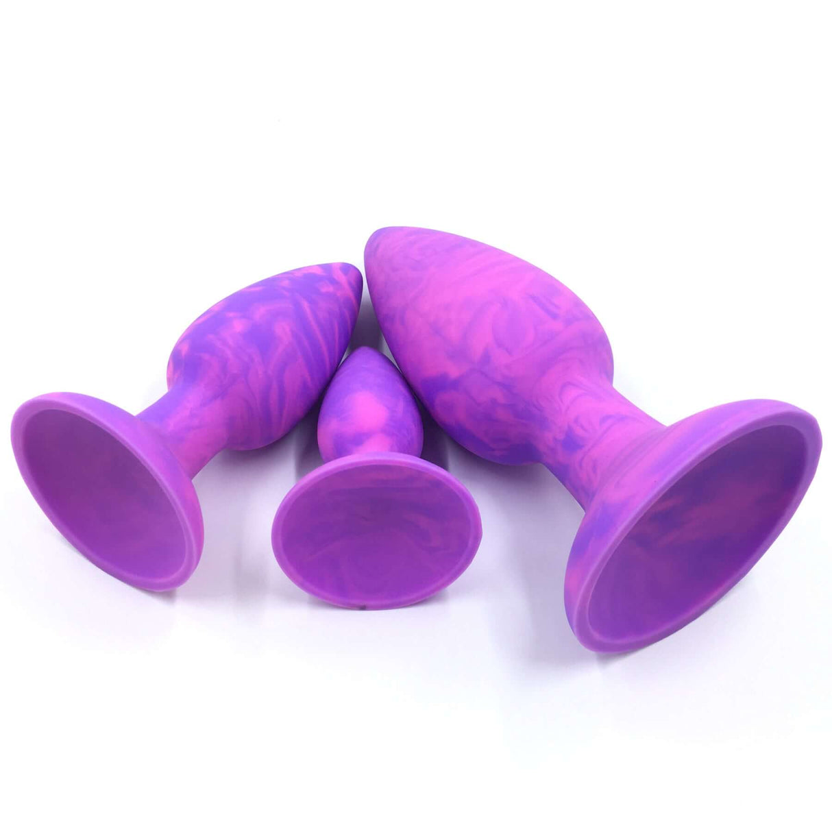 Adam & Eve Groovy Booty Silicone Anal Trainer Set featuring three progressively sized purple silicone trainers.