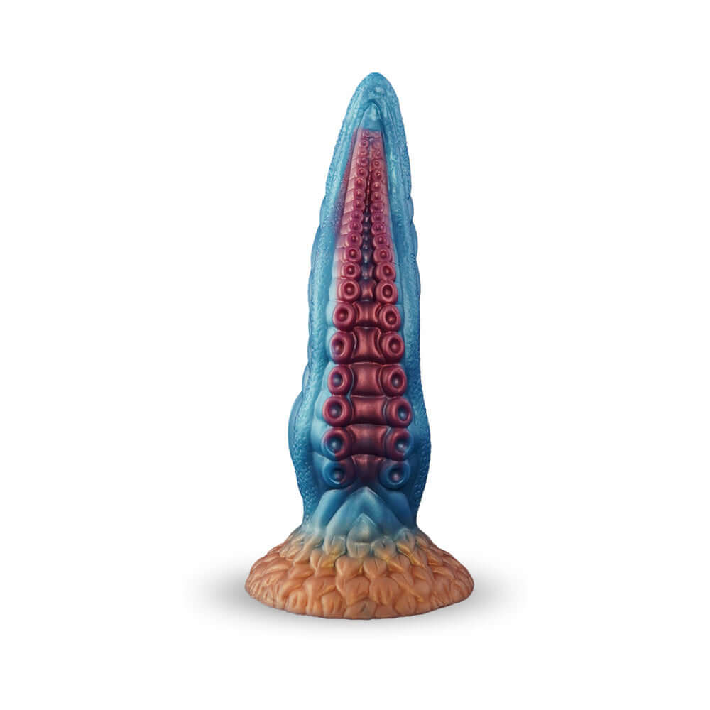 Camtoyz Fantasy Dildo Hydrana in blue with a sculpted scale pattern and curved silhouette.