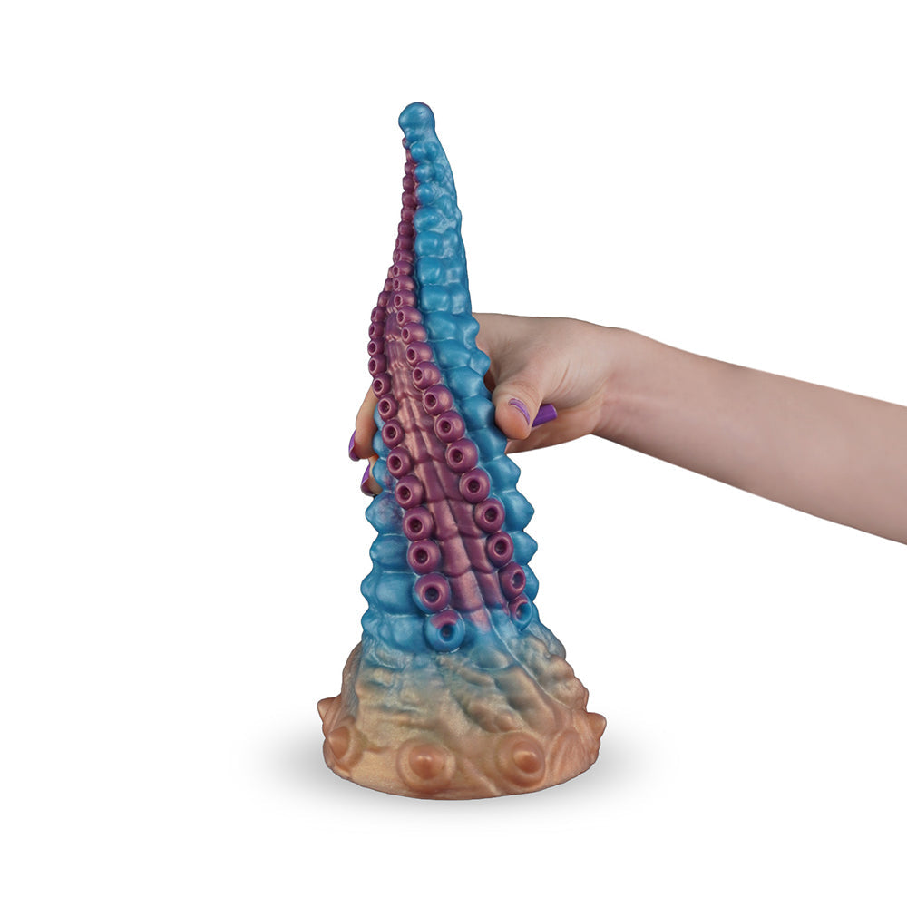 Camtoyz Fantasy Dildo Vortex held in hand, featuring artistic tentacle design in vibrant colors.