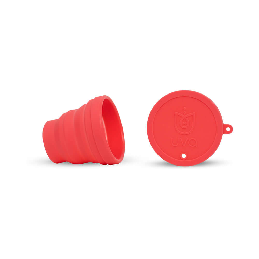 Uva Cup A Menstrual Cup Set in vibrant red, showcasing the reusable menstrual cup and its protective lid.