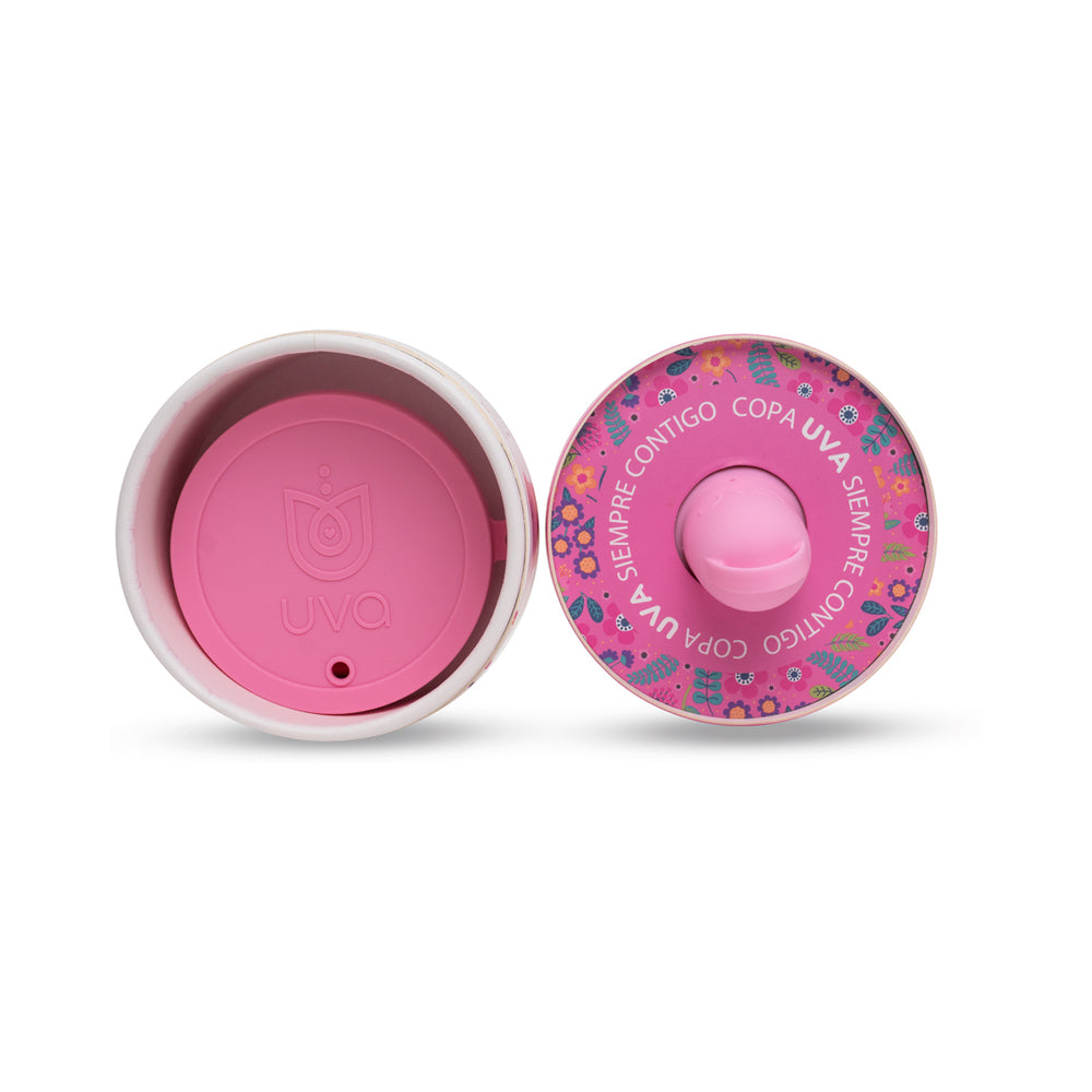 Uva Cup 0 Menstrual Cup Set inside a floral patterned container showcasing its eco-friendly design.